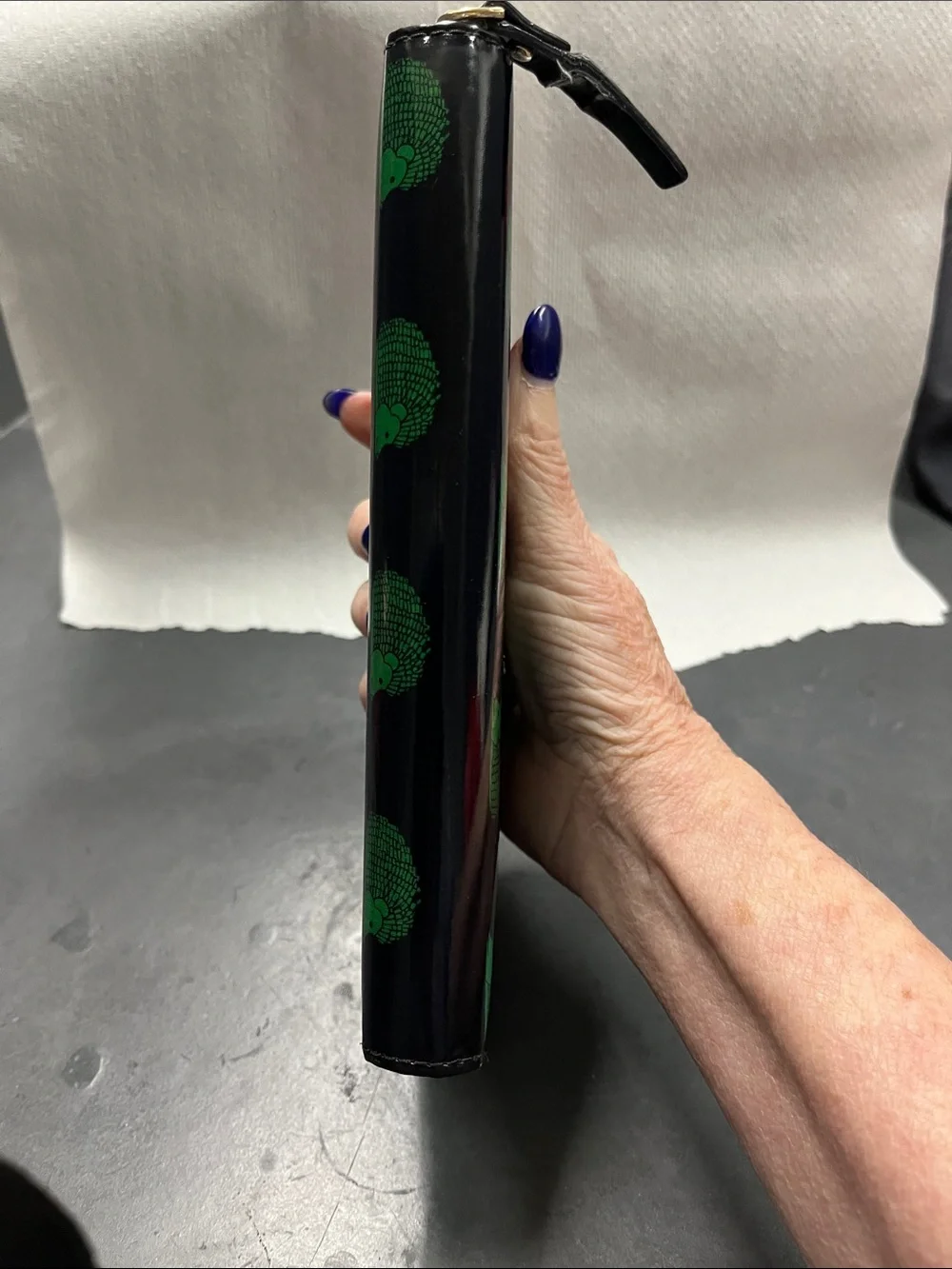 EUC Kate Spade Black Patent Wallet with Green Hedgehog Print storybook lining